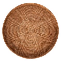 a round woven placemat on a white background