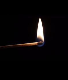 a matchstick is lit up in the dark