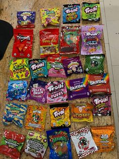 a table topped with lots of candy bags