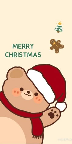 a teddy bear wearing a santa hat and scarf with the words merry christmas on it