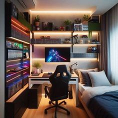 a bedroom with a bed, desk and computer monitor on the wall next to it