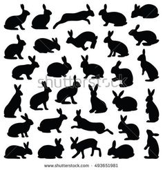 the silhouettes of rabbits are shown in different positions and sizes, including one sitting down