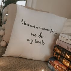 a pillow that says this bed is saved for me and my book