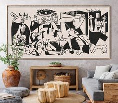 a living room filled with furniture and a painting on the wall