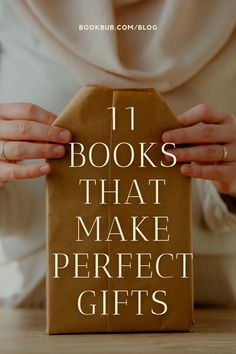 a person holding a brown paper bag with the words 11 books that make perfect gifts