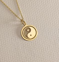 14K Real Solid Gold  Yin Yang necklace ● Material of pendant: Solid Gold 14k ( REAL GOLD ) ● Metal Stamp: 14L ( REAL GOLD ) ● The pendant is available in 6 sizes: - 14,0 mm / 0,55 inches ( Diameter ) In the photos - 15,3 mm / 0.60 inches ( Diameter ) - 16,5 mm / 0,65 inches ( Diameter ) - 19,1 mm / 0,75 inches ( Diameter ) - 21 mm / 0,82 inches ( Diameter ) - 23 mm / 0.90 inches ( Diameter ) ( In the photos the size is 14mm / 0.55 inches Diameter ) ( Jump Ring inner diameter: 4 mm ) ● Material O Gold Piercings, Yin Yang Charm, Yin Yang Necklace, Jewelry Dainty, Religious Jewelry, Layered Necklace, Yin Yang, Jump Rings, Metal Stamping