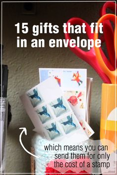 a table topped with lots of crafting supplies and text that reads 15 gifts that fit in an envelope which means you can send them for only the cost of a stamp