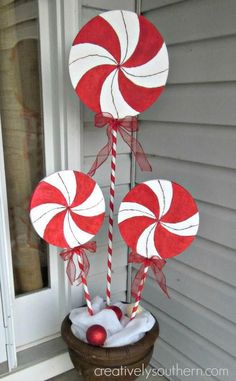 some lollipops are in a basket on the porch