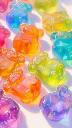 there are many gummy bears in the shape of teddy bears, all different colors