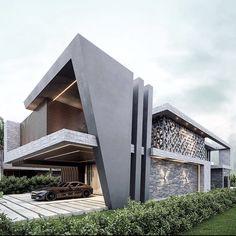 a car is parked in front of a modern house