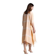 YAREN Turkish Towel pancho dress is high-quality, 100% Bamboo with fringes. One Size. Absorbs water and dries quickly. Light and space saving. Hand loomed in Turkey. Produced by dyed yarn. All fringes are knotted by ladies in the village. ⬛ DETAILS Weight : 250 g Size : Standart one size. - A gentle wash with cold water, makes the towel more absorbent and softens the fabric. - Up to ±10% change on dimension and weight, imperfections in pattern and color must be tolerated as a result of handloom Beige Beachwear Kaftan For The Beach, Beachwear Cover-up For Vacation, Oversized Summer Dress For Beach Cover-up, Vacation Beachwear Cover-up, Cotton Beachwear Dress For Beach, Beige Kaftan For Beach Cover-up, Cotton Beach Dress For Beach Season, Cotton Beachy Dress For The Beach, Breezy Cotton Beach Dress