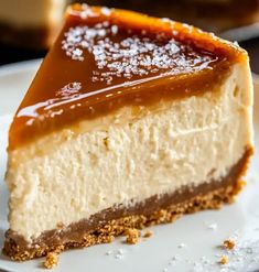 a piece of cheesecake with caramel topping on a plate