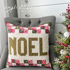 a christmas pillow with the word noel on it