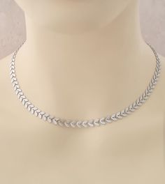 Detailed silver leaf choker/necklace.  Dainty and easy to wear.  Wear it on its own or layered with other necklaces.  Also available in gold in this shop. The necklace comes with a 2in extension chain, The necklace will arrive in a bag ready for giving. Silver Leaf-shaped Necklace, Leaf Jewellery, Botanical Jewelry, Leaf Jewelry, Bridesmaid Necklace, Necklace Dainty, Leaf Necklace, Choker Necklaces, Gold Jewellery Design