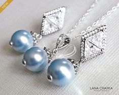 Wedding Light Blue Blush Baby Blue Colored Pearl Silver Earrings and Necklace Bridal Jewelry Set with .925 Sterling Silver Chain. CHAIN is 18 inches (45.7cm) long. EARRINGS are about 1.18 inch (3cm) long from top of earring stud to bottom. PENDANT is about 0.90 inch (2.3cm) long including bail. BRIDAL BRACELET SECTION: https://www.etsy.com/shop/LanaChayka?ref=seller-platform-mcnav§ion_id=11638942 BRIDAL EARRINGS SECTION: https://www.etsy.com/shop/LanaChayka?ref=seller-platform-mcnav§ion_id=11638940 BRIDAL JEWELRY SETS SECTION: https://www.etsy.com/shop/LanaChayka?ref=seller-platform-mcnav§ion_id=25839214 BRIDAL NECKLACES SECTION: https://www.etsy.com/shop/LanaChayka?ref=seller-platform-mcnav§ion_id=11638944 Elegant and classy, this stunning jewelry set is perfect for weddings or special oc Blue Teardrop Jewelry For Wedding, Blue Teardrop Jewelry Sets For Formal Occasions, Blue Wedding Jewelry With Matching Earrings, Blue Teardrop Wedding Jewelry, Sapphire Jewelry Sets For Wedding, Blue Round Bridal Earrings For Formal Occasions, Light Blue Sterling Silver Earrings For Wedding, Light Blue Sterling Silver Wedding Earrings, Blue Pearl Drop Wedding Jewelry