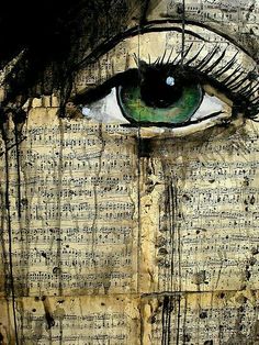 an image of a woman's eye with music sheets in the background