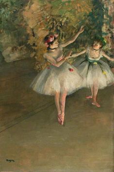 two ballerinas in white tutus are dancing