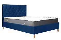 a bed with a blue headboard and white mattress on it's side, in front of a white background