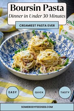 a bowl filled with pasta on top of a table