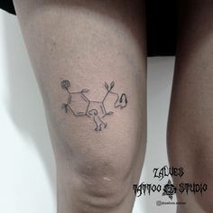 a tattoo on the leg of a woman