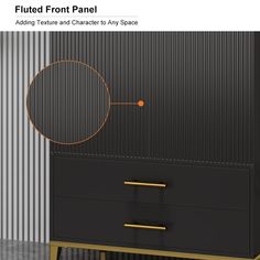 a black and gold dresser with an orange circle on the front panel, next to a metal wall