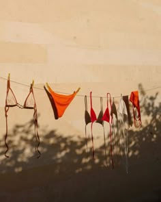 #bikini #swimsuit #summer #summerlife #sea #aesthetic bikinies Beach Mood Board Aesthetic, Swim Flatlay, Aestethic Bikinis Hanging Up, Hot Summer Aesthetic, Swimwear Brand Aesthetic, Swimsuit Campaign, Red Bikinis For Women Aesthetic, Orange Swimwear Aesthetic, Cute Aesthetic Bikinis Red