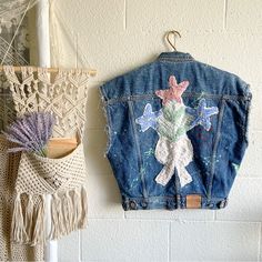 Such A Lovely, Unique And One Of A Kind Piece Of Art Which Is Timeless. A Classic Denim Vest With Large Embroidery On The Back And Paint Splatter Detailing Throughout And Distressed Sleeve Cuffs. Condition: New (With Tag) Color: Denim Contents: 100% Cotton Care: Machine Wash Cold Measurements: Pit To Pit: 24” Length: 25” From Free People: Please Note: Due To The Handmade Nature Of This Style, Each Piece Is Unique And May Vary From The Photo. Reworked From Handpicked Textiles, This Effortlessly E Denim 2023, Orange Oversized Sweater, Free People Vest, White Denim Vest, Shirt Upcycle, Large Embroidery, Cozy Vest, Upcycle Clothing, Cable Knit Vest