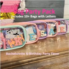 an assortment of bags with letters and animals on them