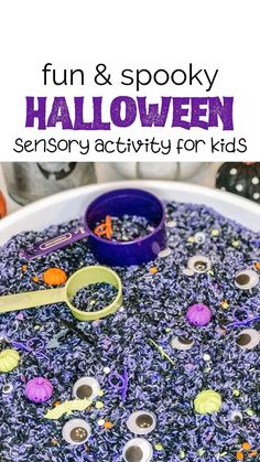 a bowl filled with halloween spooky beads and purple plastic spoon sitting on top of it