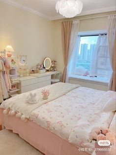 a bed room with a neatly made bed next to a dresser and a large window