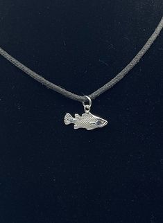 Swimming fish. Small, Light, beautiful, and easy to carry, this piece is perfect for any occasion. Jewelry for lovers of the sea. This is a unique work done all by the sea passionate artist, design, production, and finish.  This pendant is included with a black waxed cord necklace(18). **Note: Pictures are enlarged to show detail. All pendants are packaged and shipped in a cotton baggy inside a water and tear-resistant bubble wrap envelope. If you have any questions about this item or any other items listed in our shop please do not hesitate to contact us.** Made out of .925 Sterling Silver. Completely solid, light, and double-sided. Recommend for adults and teens. MADE IN USA Copyright belonging to Lluch Art Design. Funky Silver Necklace, Funky Jewelry Necklaces, Snapper Fish, Swimming Fish, 3d Pendant, Soldered Pendants, Fish Jewelry, Fish Necklace, Note Pictures