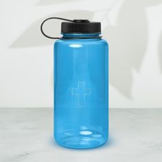 Stay hydrated with this large water bottle. Its wide mouth makes it easy to add ice or fruits, and the handle makes it easy to carry. Ideal for everyday use, outdoor activities, and workouts. * Material: Tritan (BPA-free plastic) * Volume: 32 oz. (940 ml) * Dimensions: 8.27″ × 3.54″ (21cm × 9cm) * Wide mouth * Handle * Blank product sourced from China Disclaimer: Not dishwasher or microwave safe. Hand-wash only. Large Water Bottle, Wide Mouth, Micro Onde, Plastic Water Bottle, Outdoor Activities, Water Bottles, Drinkware, Halloween Shopping, Barware