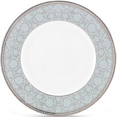 a white and blue plate with silver trim