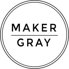 the maker gray logo is shown in black and white, with an oval frame around it