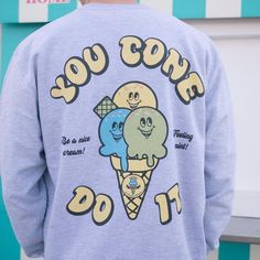 Men's printed sweatshirt with “You Cone Do It” slogan and vintage ice cream cone character graphic. Small logo on front, large back print.You'll feel mint in this vintage style graphic sweater. Slouchy fit. Makes a great gift and a sweet self purchase for summer staycation. All Batch1 products are lovingly designed, printed and packed by hand in the UK at Batch1 HQ.  Our garments are made to order to minimise wastage and printed using water-based, eco-friendly inks. We are committed to creating Cool Graphic Print Crew Neck Sweatshirt, Retro Long Sleeve Slogan Sweatshirt, Ice Cream Graphic, Summer Staycation, Women Slogan, Slogan Sweatshirt, Vintage Ice Cream, Character Graphic, Graphic Sweaters