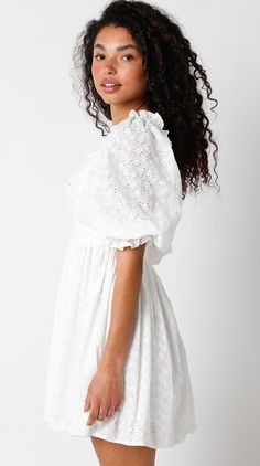 Get ready to turn heads at your next event in the Samantha White Eyelet Puff Sleeve Mini Dress! Delicate white pierced eyelet lace fabric and boasts a chic plunge neckline that's undeniably flattering. The half puff sleeves (with elastic), and a ruffle trim provide a romantic touch. Features a hidden back zipper closure. So go ahead, put on your favorite strappy heels and get ready to slay in this must-have dress DETAILS & FIT S: 30" length, 26" waist, 29" bust M: 30.5" length, 28" waist, 31" bu Eyelet Lace Fabric, Babydoll Mini Dress, Puff Sleeve Mini Dress, Boho Pink, Plunge Neckline, White Eyelet, Eyelet Lace, Dress Boho, Lace Mini Dress