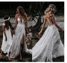 three women in white dresses standing next to each other and holding hands with one another