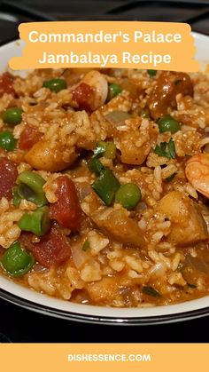 a white plate topped with rice and shrimp