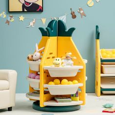 a child's play room with toys and accessories on the floor, including a yellow toy stand