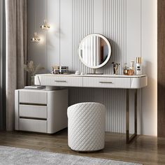 a white vanity with a round mirror and stool