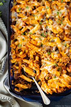 a casserole dish filled with pasta and cheese