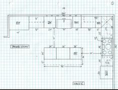 a drawing of a kitchen with the floor plan drawn out and measurements in front of it