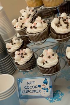 cupcakes with white frosting and chocolate chips on top