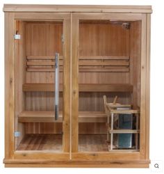 a wooden sauna with glass doors and shelves in the center, on a white background