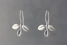 Silver Earrings - Adorable trefoil of leaves fixed on a simple hook wire. Perfect for everyday wear.<br><br>0.88l, 0.56w. Bright and oxidized silver feature sterling ear wires, gold features 18k plated nickel-free ear wires. Silver Earrings Aesthetic, Silver Flowers Jewelry, Small Silver Earrings, Simple Silver Earrings, Sliver Earrings, Silversmithing Jewelry, Vintage Silver Earrings, Oxidised Silver Jewelry, Indie Jewelry