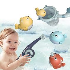 a baby playing in the water with toys and fish on it's back legs