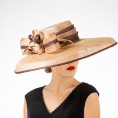 Sophisticated ladies Kentucky Derby hat in neutral tan. This beautiful hat will complement almost any outfit. Also available in pink. Elegant Cream Wide Brim Fedora, Chic Brown Brimmed Boater Hat, Elegant Beige Fedora, Elegant Beige Short Brim Fedora, Chic Brown Short Brim Boater Hat, Elegant Cream Fedora Hat, Elegant Brown Fedora For Beach, Chic Brown Boater Hat With Short Brim, Beige Short Brim Hat For Formal Occasions