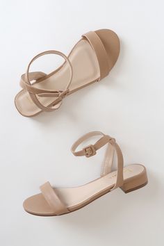 Lulus Exclusive! The Lulus Darryian Light Nude Ankle Strap Sandals add the perfect amount of chic to any look! Sleek vegan leather shapes these versatile sandals that have a slender toe strap and matching ankle strap with a square buckle. Low block heel adds just the right amount of height! 1" wrapped block heel. Lightly cushioned insole. Rubber sole has nonskid markings. Man Made Materials. Imported. Lulus | Darryian Light Nude Ankle Strap Sandal Heels | Size 5 | Beige | Vegan Friendly.