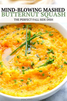 the best mashed butternut squash recipe in a white bowl with green garnish