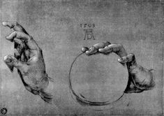 two hands holding a circular object in one hand and another hand reaching for it with the other